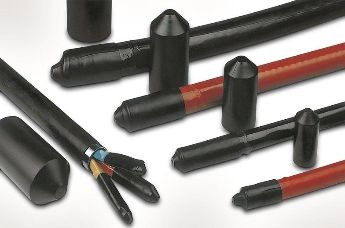 Heat shrink end caps with adhesive lining for sealing cable ends